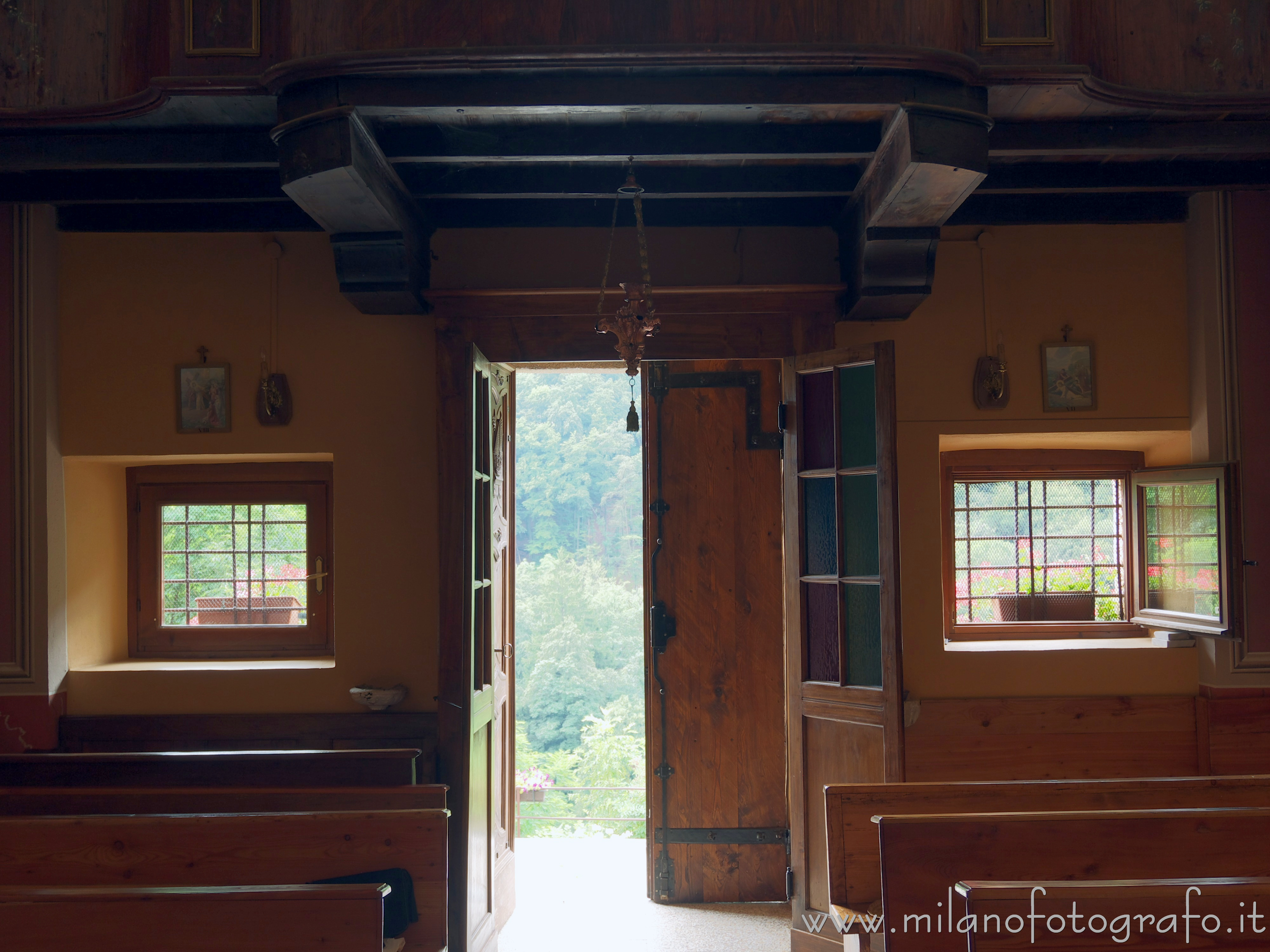 Valmosca fraction of Campiglia Cervo (Biella, Italy) - View over the woods of the Cervo Valley from inside the San Biagio Church